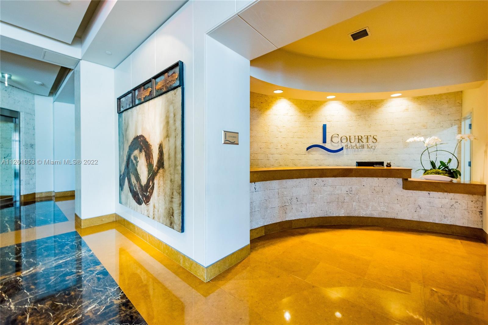 801 Brickell Key Boulevard, Unit 2401 Miami, FL 33131 - Photo 24 of 35 a bathroom with a tub