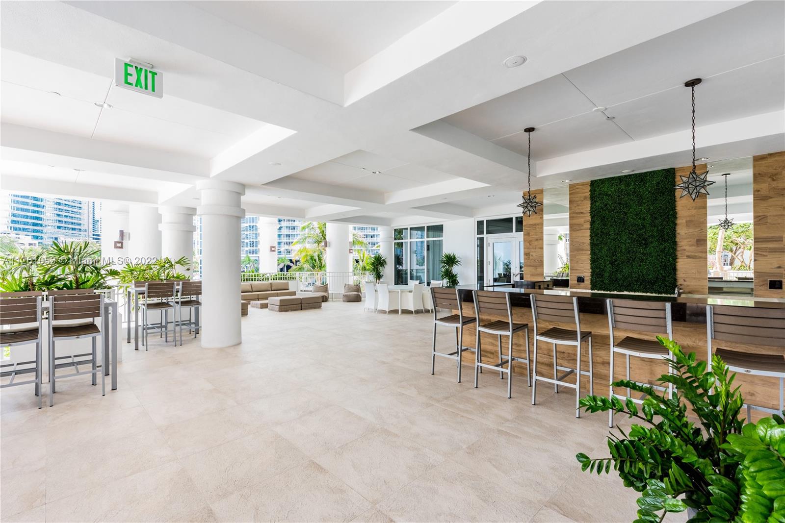 801 Brickell Key Boulevard, Unit 2401 Miami, FL 33131 - Photo 25 of 35 a view of a dining room with furniture window and outside view