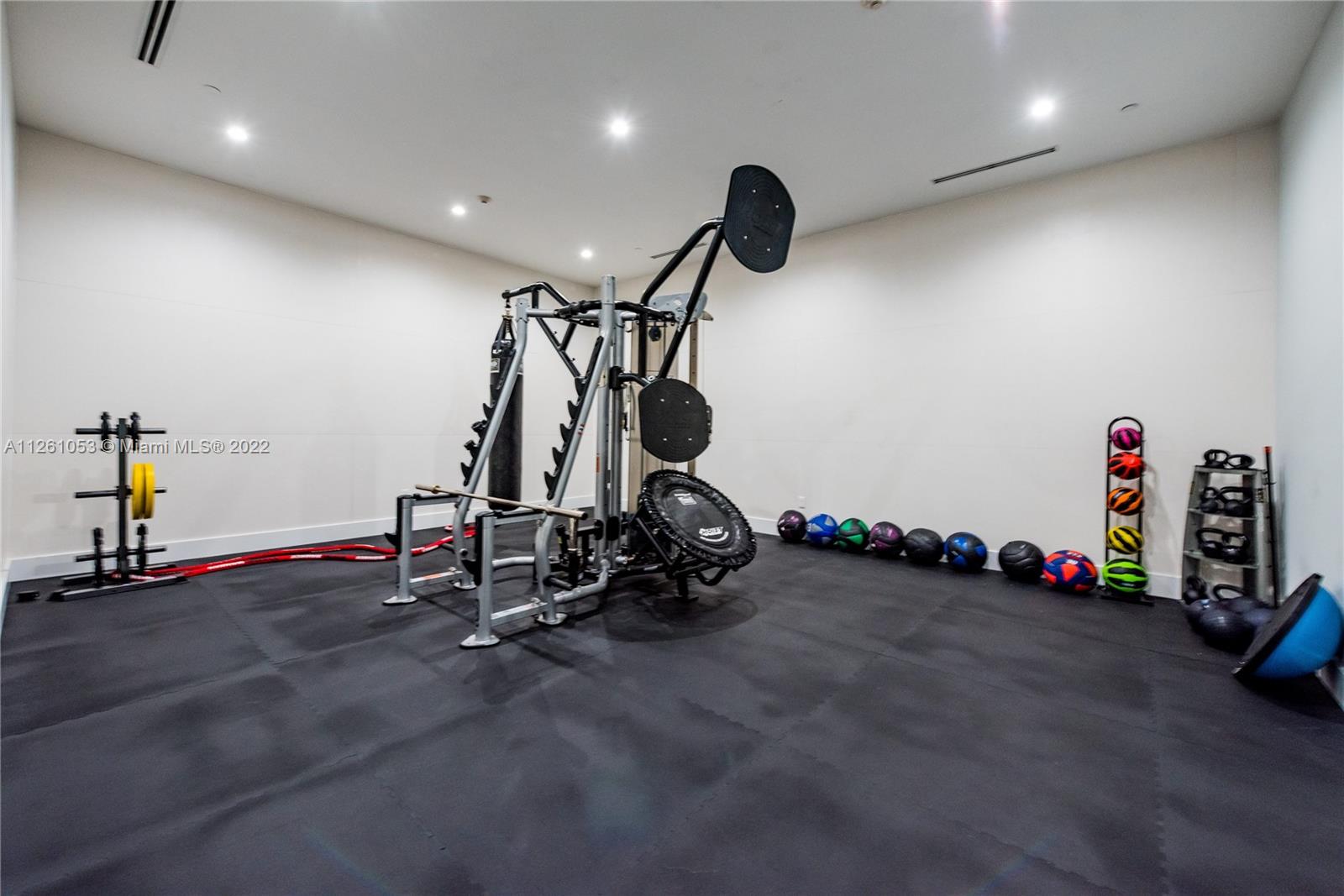 801 Brickell Key Boulevard, Unit 2401 Miami, FL 33131 - Photo 30 of 35 a view of a room with gym equipment