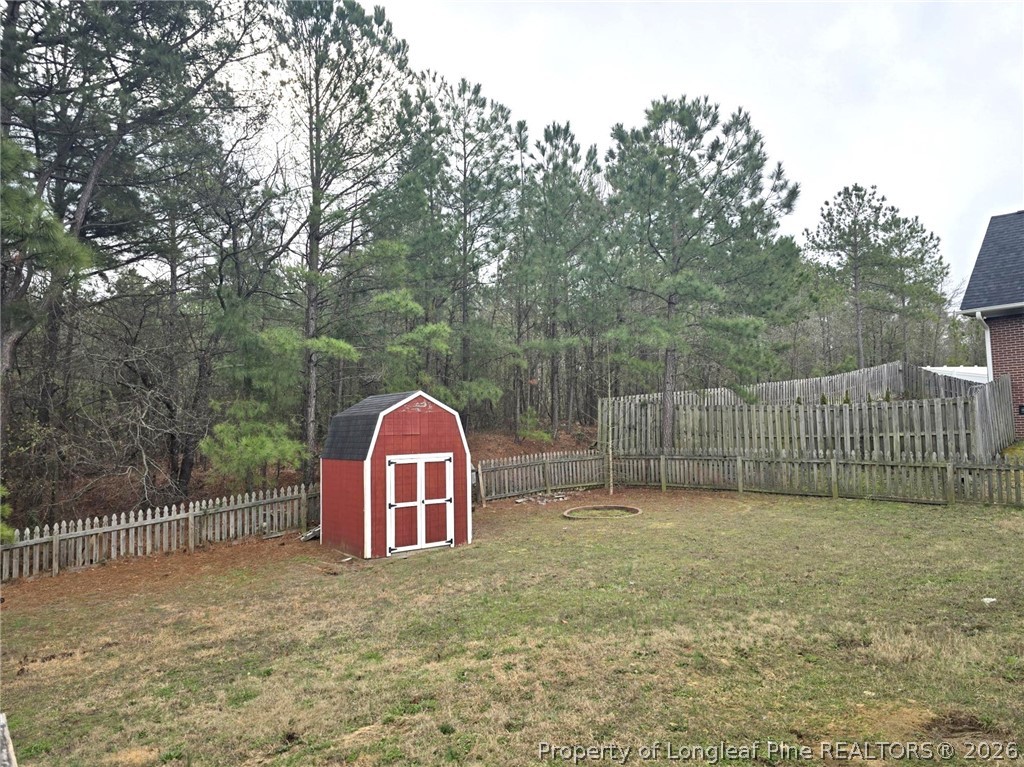 5527 Rising Ridge Drive Hope Mills, NC 28348 - Photo 22 of 35 a view of a backyard