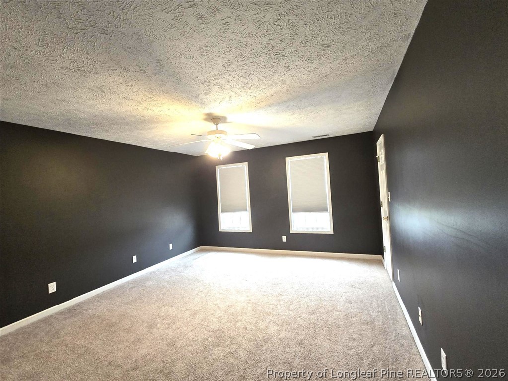 5527 Rising Ridge Drive Hope Mills, NC 28348 - Photo 25 of 35 a view of an empty room with a window
