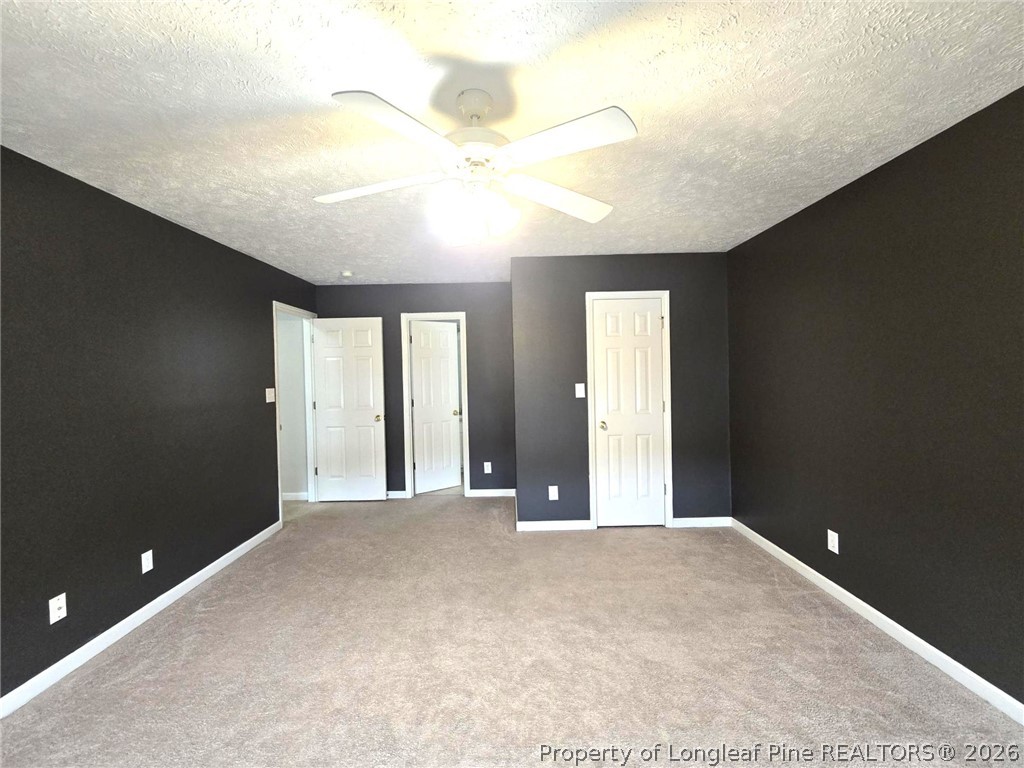 5527 Rising Ridge Drive Hope Mills, NC 28348 - Photo 27 of 35 a view of a big room with windows and cabinet