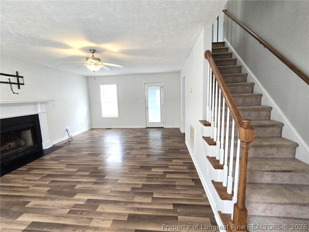 5527 Rising Ridge Drive Hope Mills, NC 28348 - Photo 4 of 35 a view of entryway and hall with wooden floor