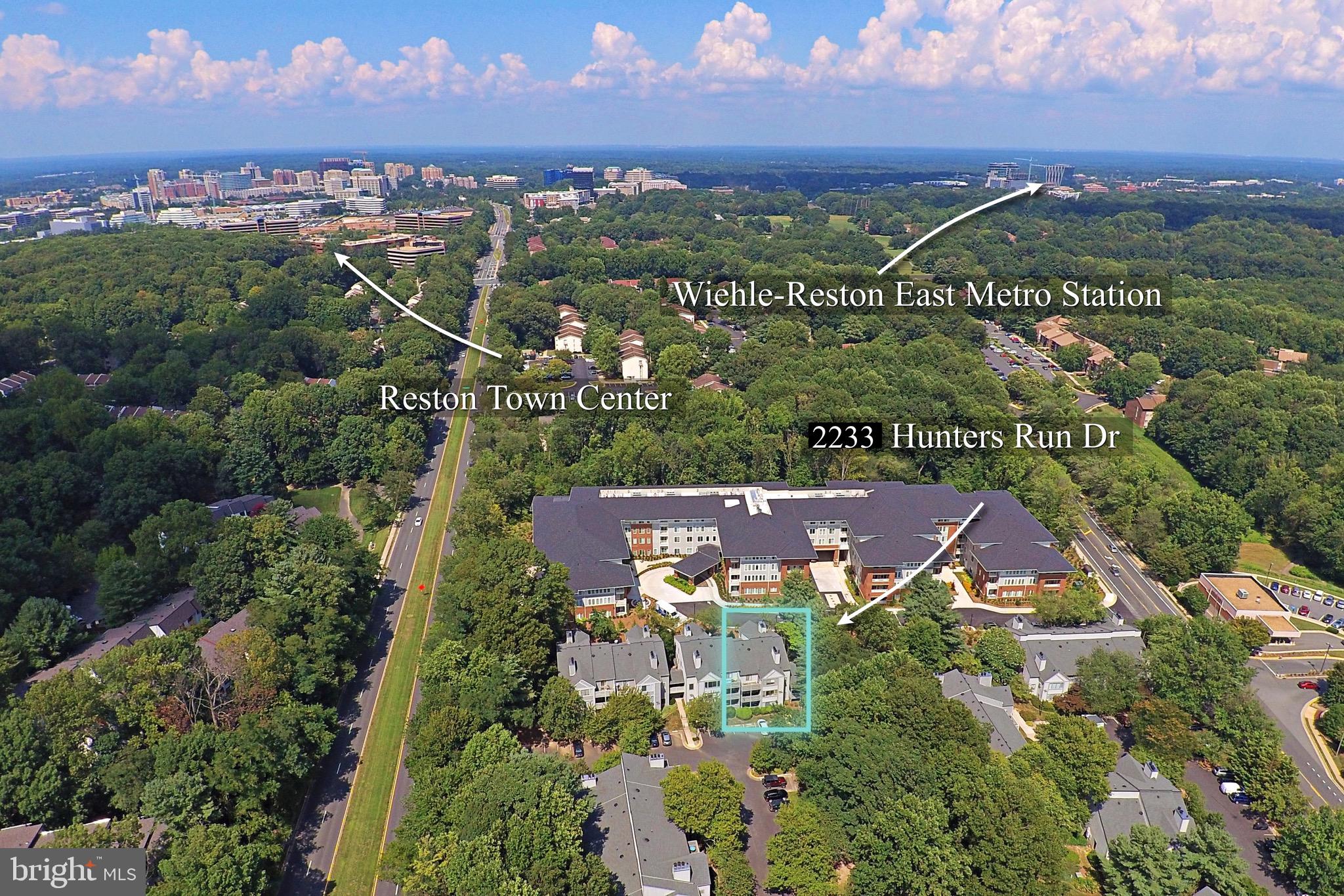 2233 Hunter's Run Drive Reston, VA 20191 - Photo 2 of 50 a view of a city with sunset view