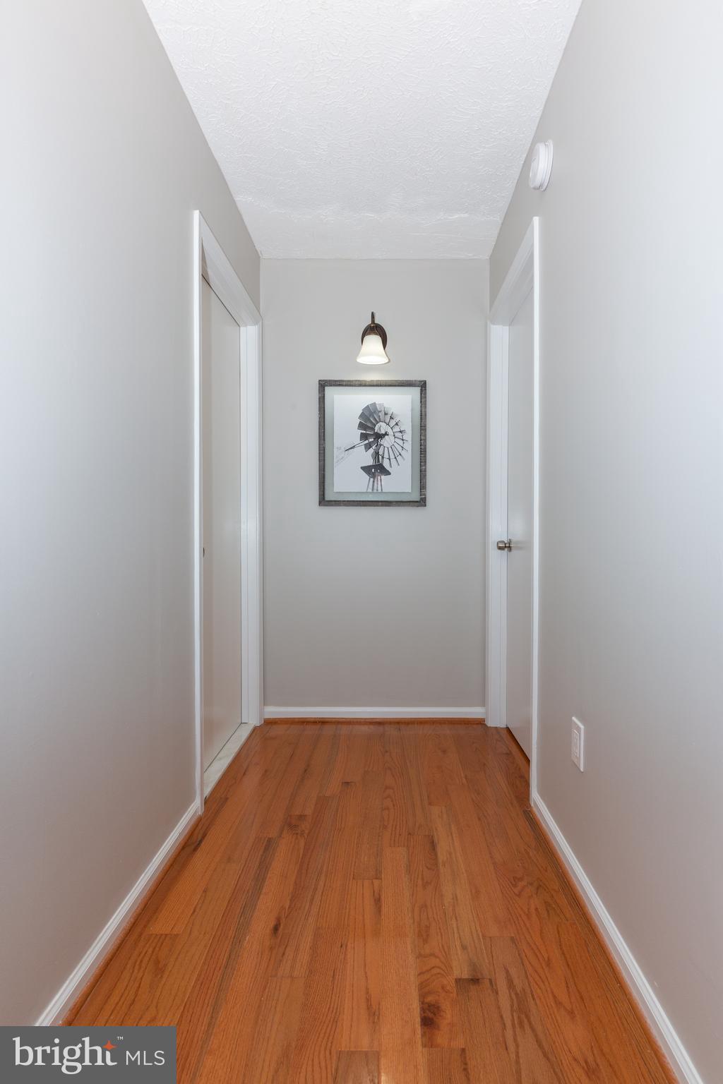 2233 Hunter's Run Drive Reston, VA 20191 - Photo 16 of 50 a view of a room with wooden floor