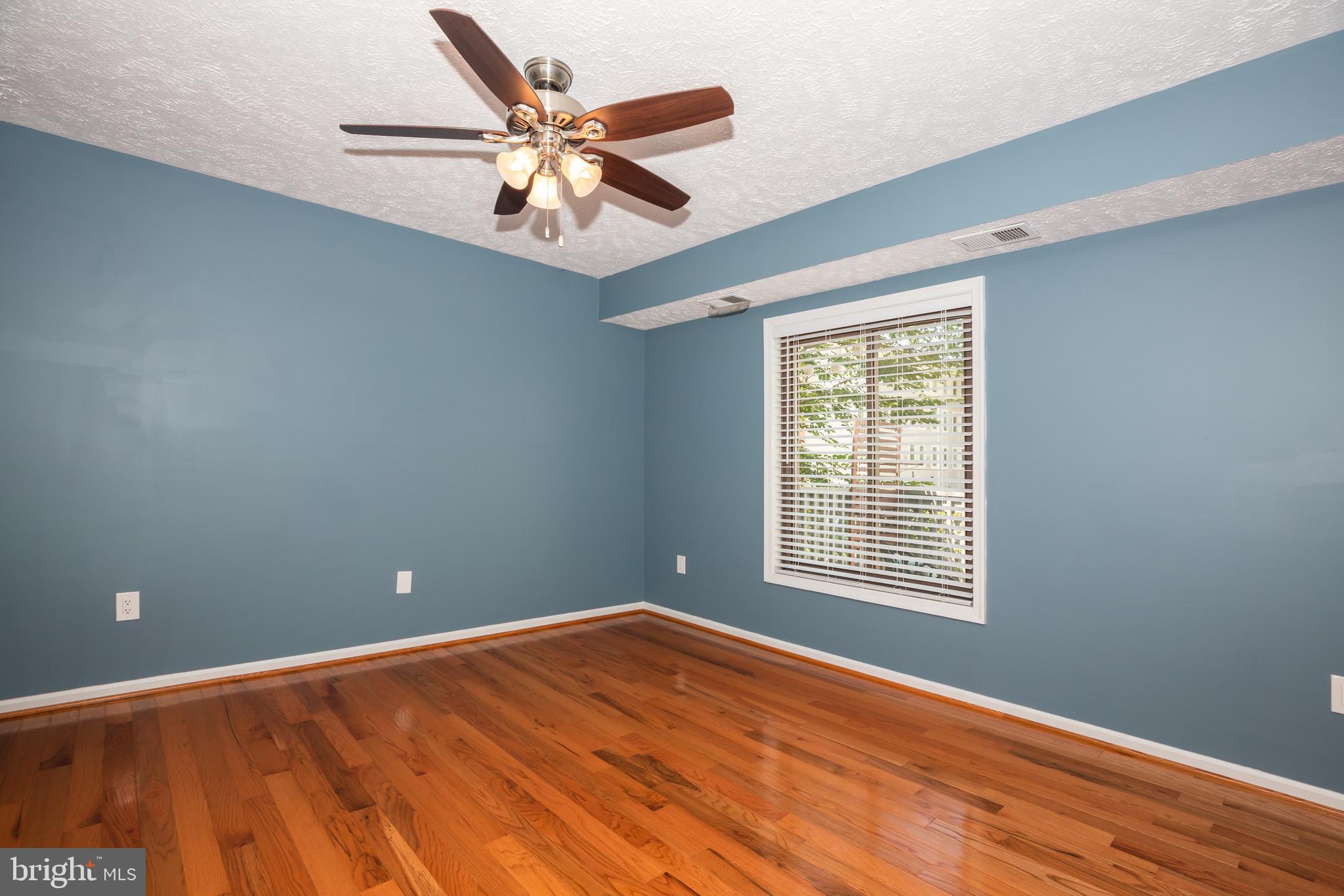 2233 Hunter's Run Drive Reston, VA 20191 - Photo 18 of 50 a view of an empty room with a window