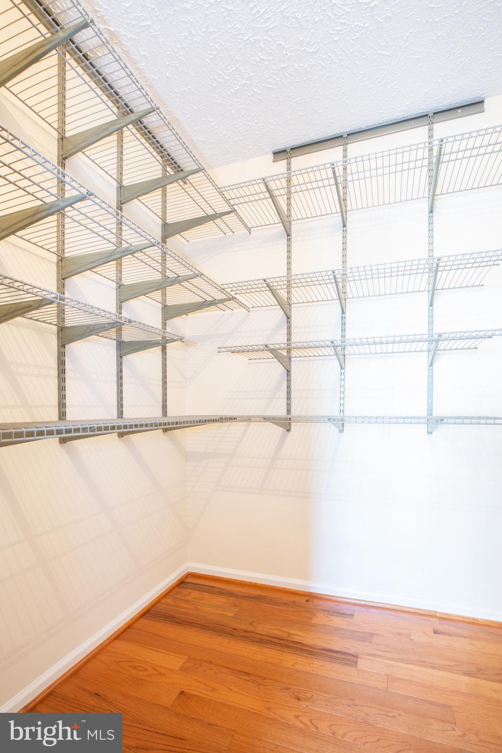 2233 Hunter's Run Drive Reston, VA 20191 - Photo 20 of 50 a view of a room with racks on the wall and a window