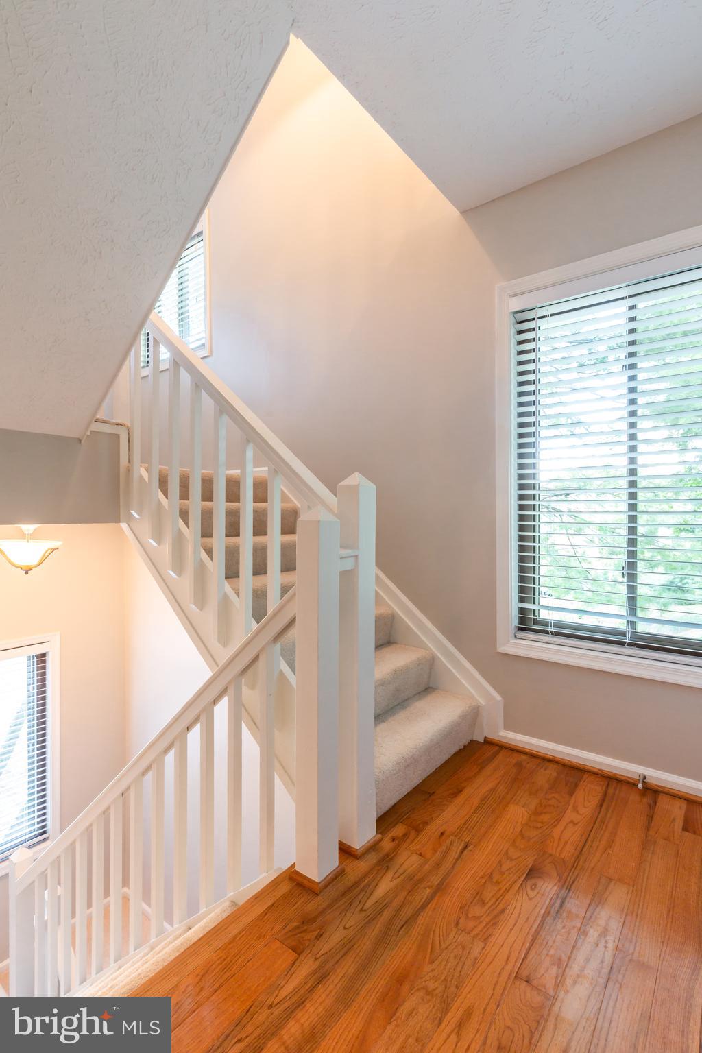 2233 Hunter's Run Drive Reston, VA 20191 - Photo 21 of 50 a view of entryway with wooden floor