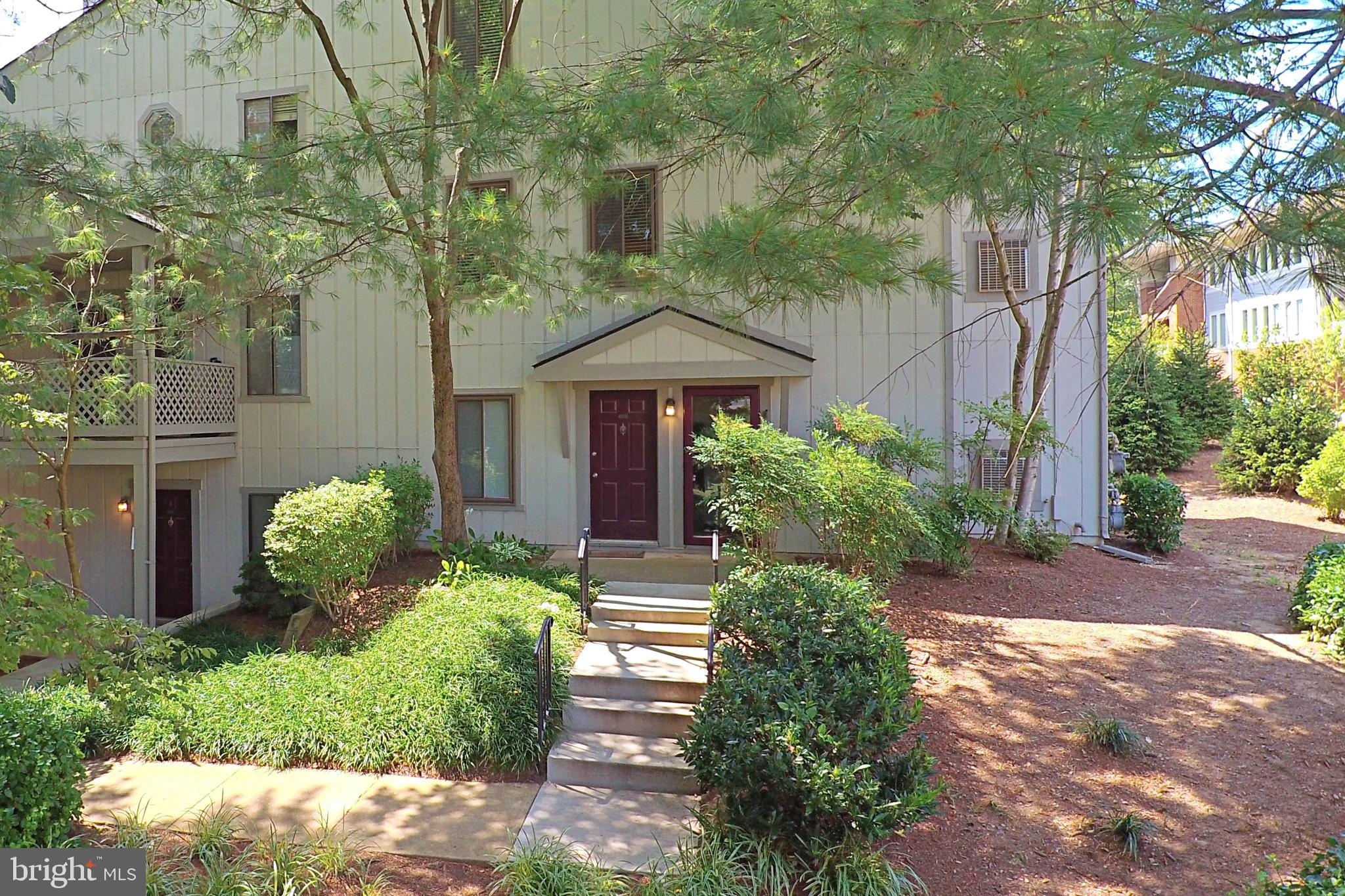 2233 Hunter's Run Drive Reston, VA 20191 - Photo 37 of 50 a front view of a house with garden