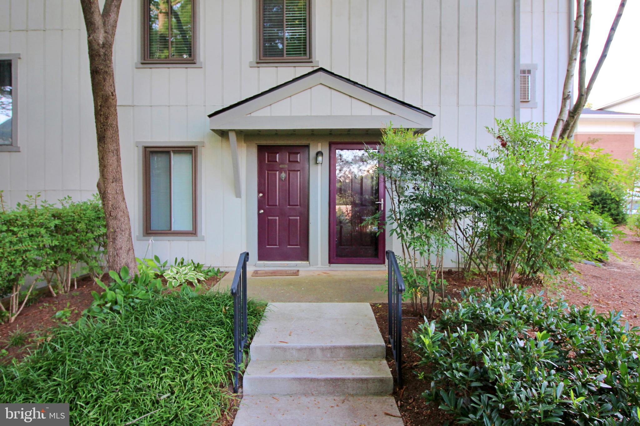 2233 Hunter's Run Drive Reston, VA 20191 - Photo 38 of 50 a front view of a house with garden