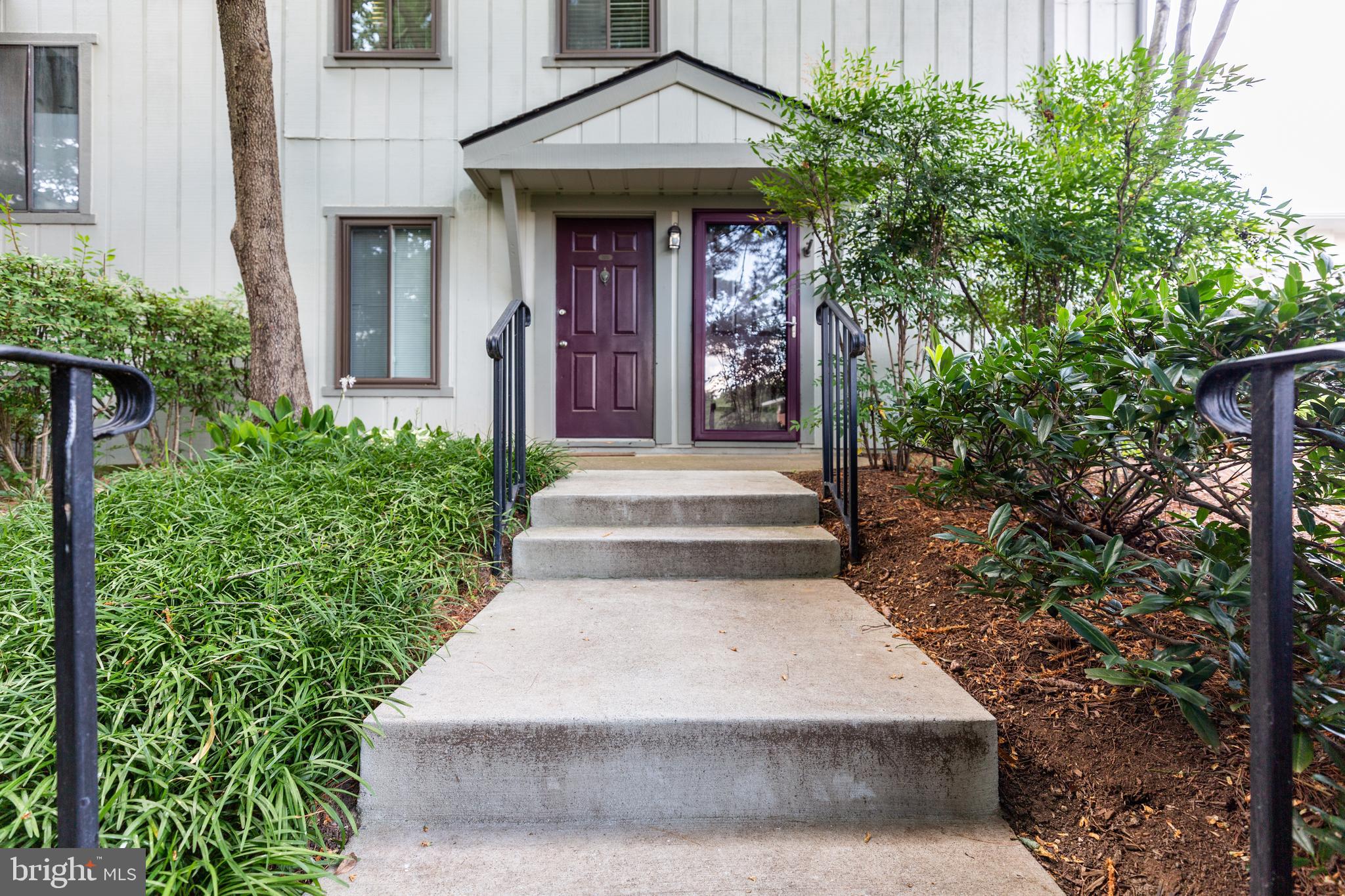 2233 Hunter's Run Drive Reston, VA 20191 - Photo 39 of 50 a front view of a house with garden