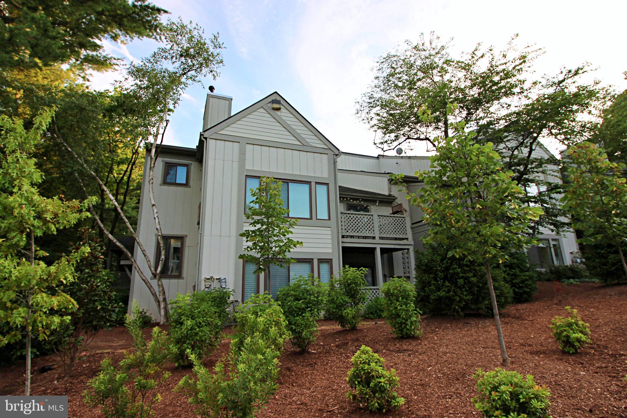 2233 Hunter's Run Drive Reston, VA 20191 - Photo 41 of 50 a front view of a house with a yard