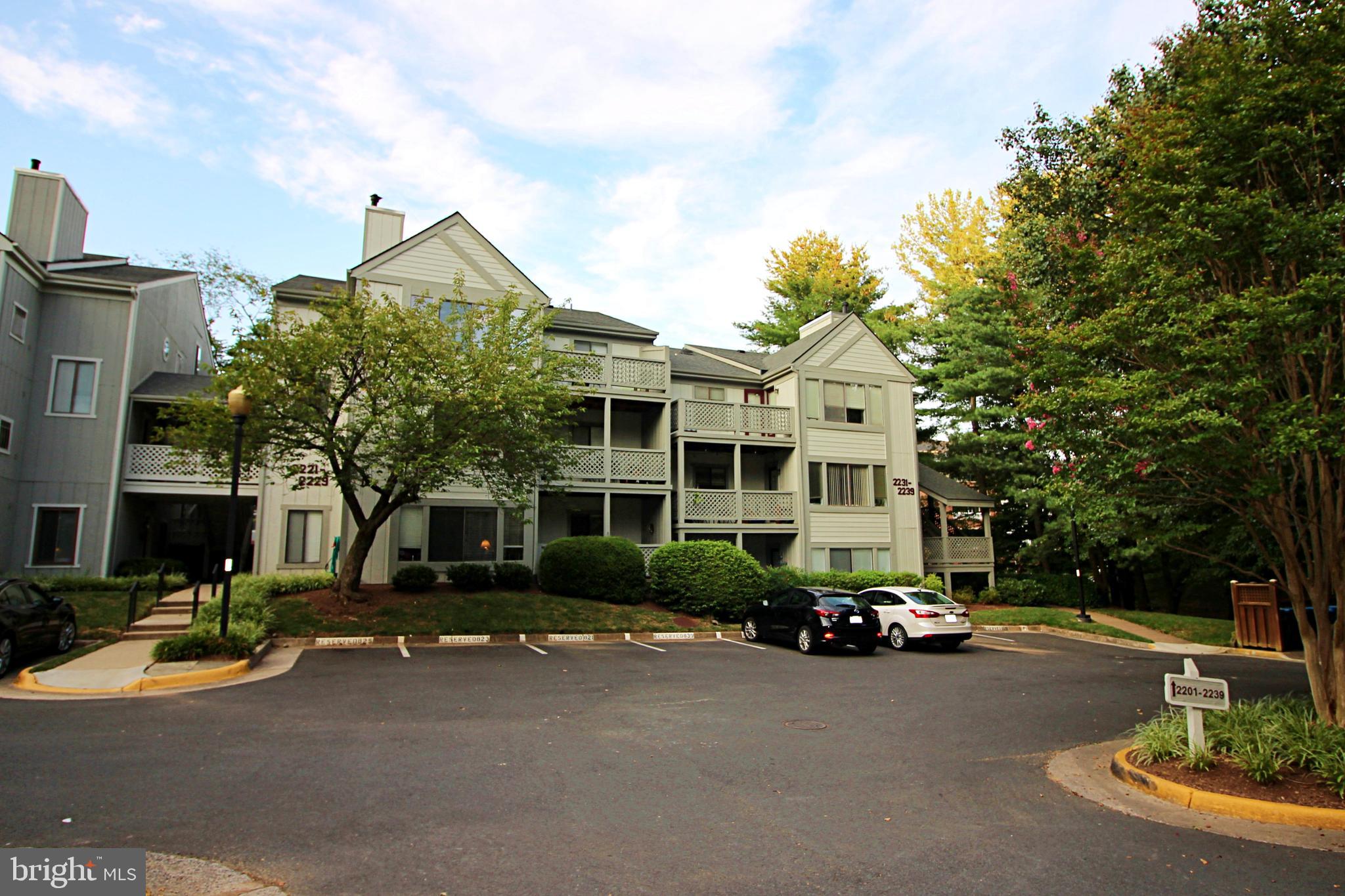 2233 Hunter's Run Drive Reston, VA 20191 - Photo 45 of 50 a couple of cars parked in front of a house