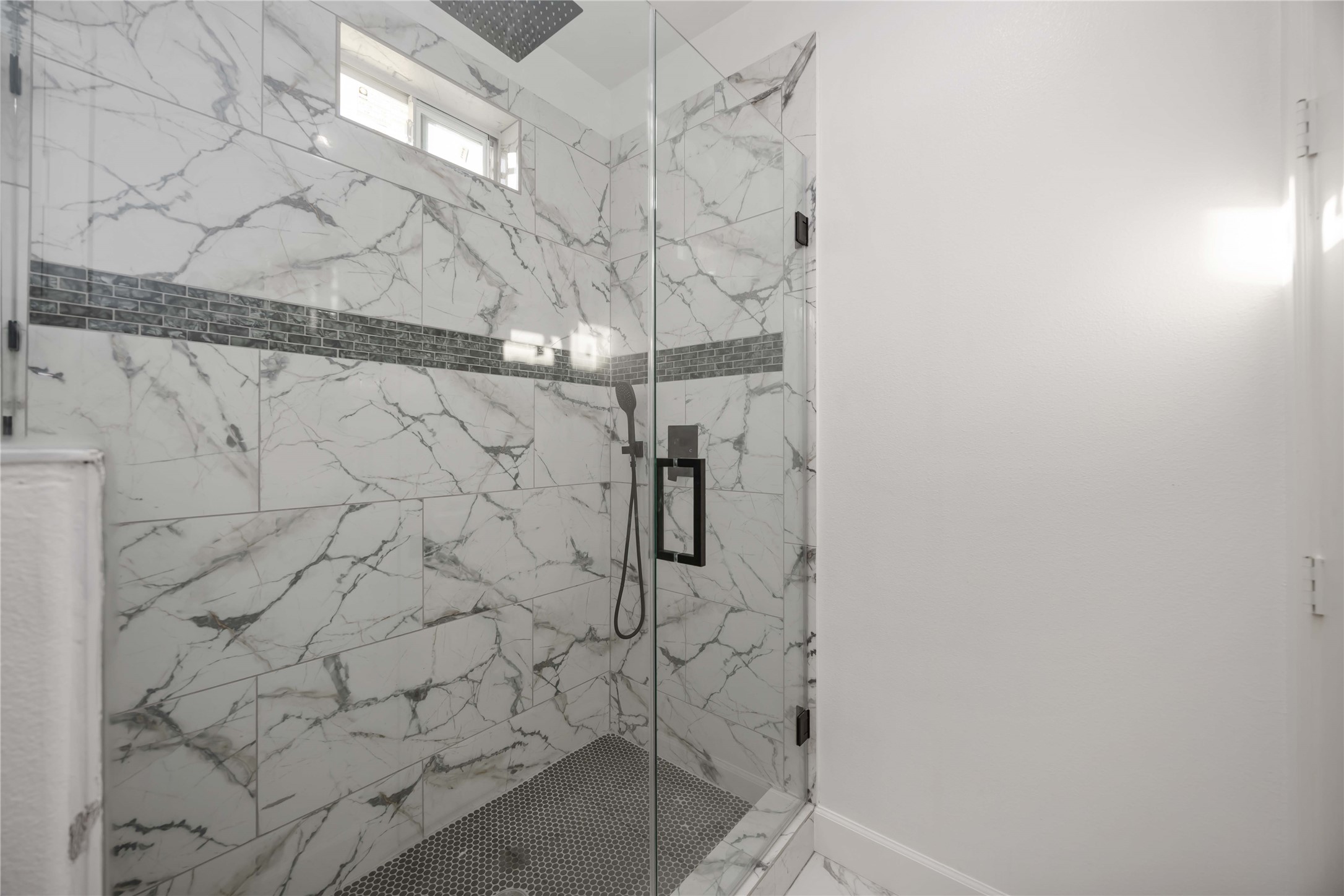 813 Fortune Street Houston, TX 77088 - Photo 20 of 27 a bathroom with a shower