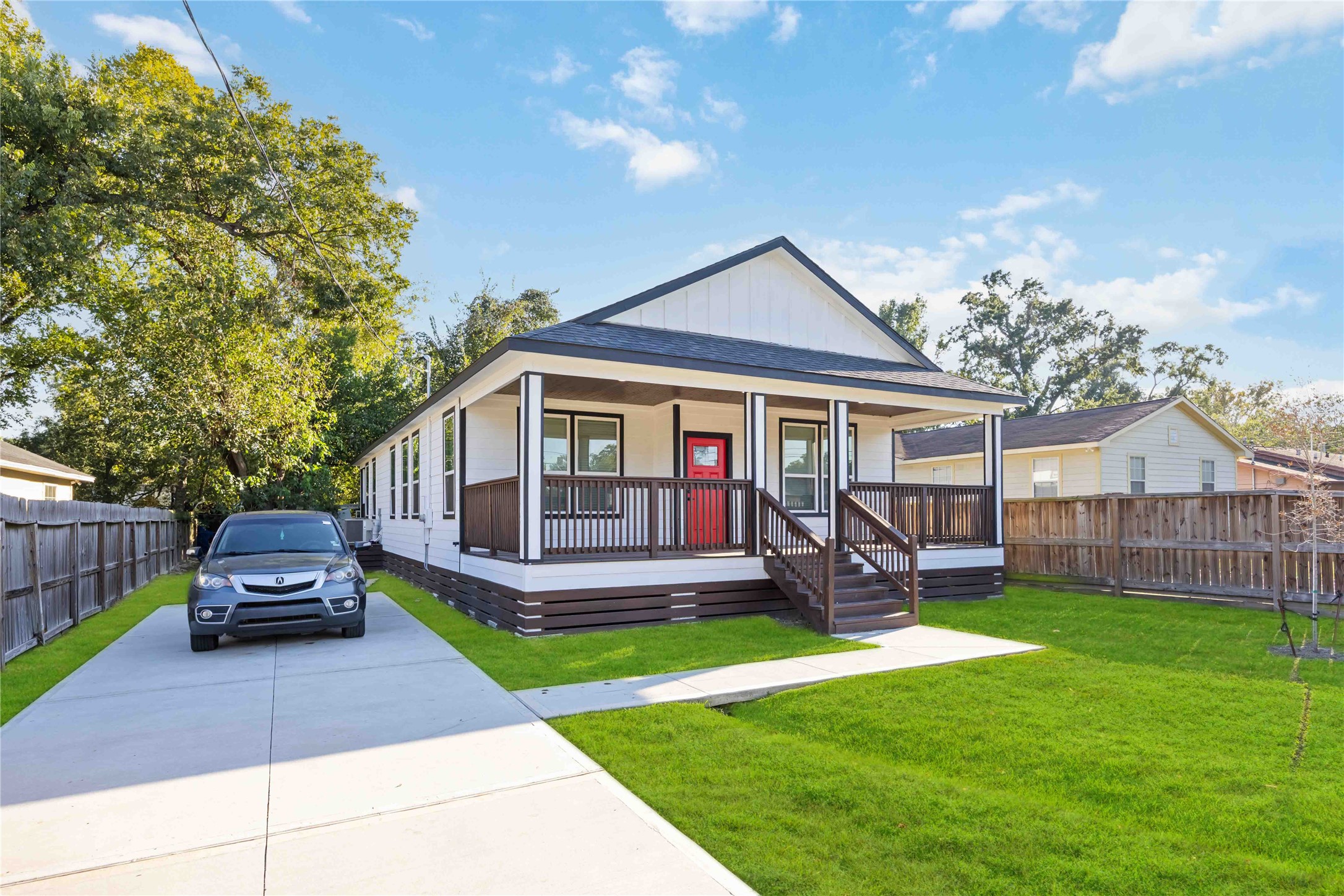 813 Fortune Street Houston, TX 77088 - Photo 2 of 27 a view of a house with a yard and sitting area