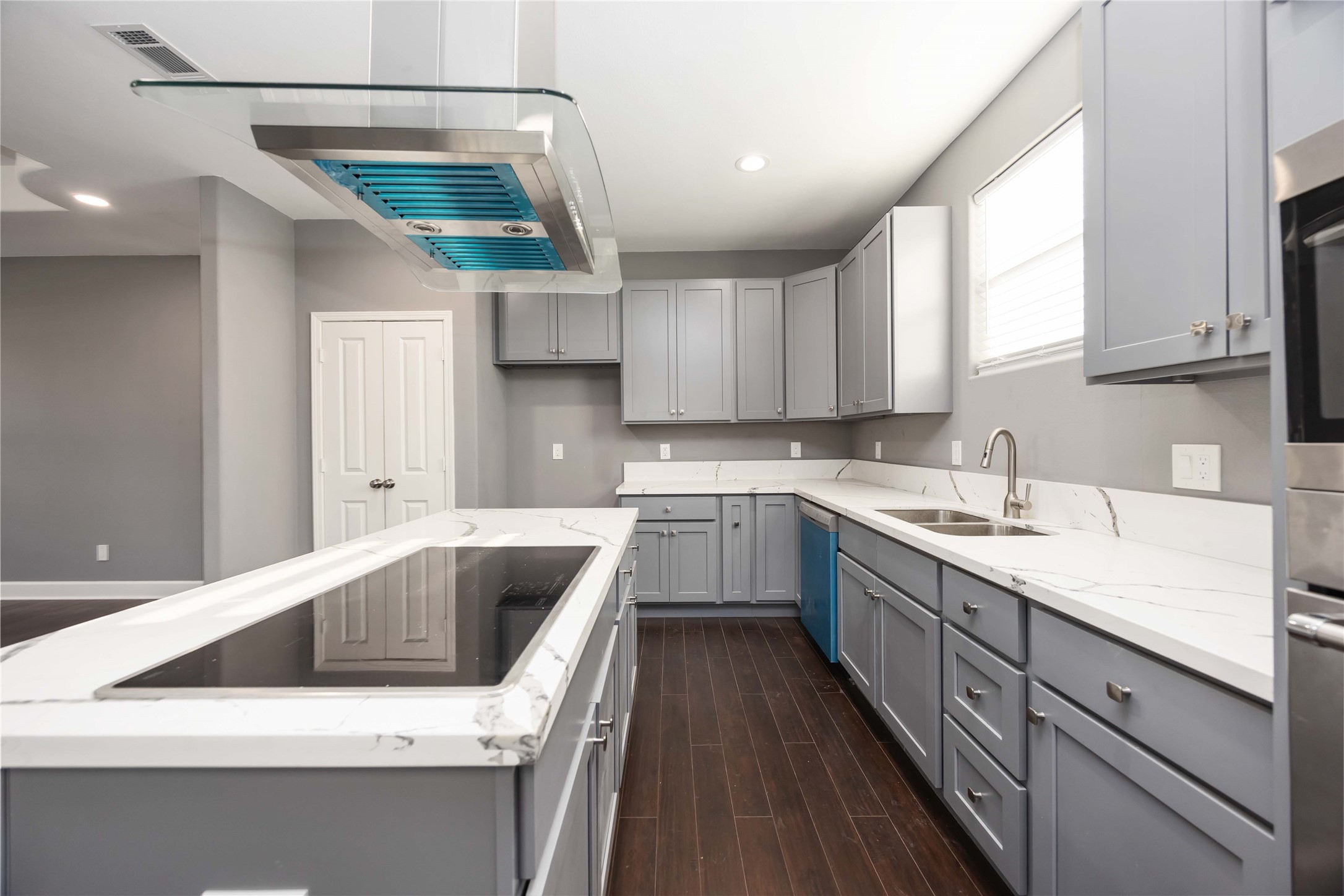 813 Fortune Street Houston, TX 77088 - Photo 8 of 27 a kitchen with a sink a stove and cabinets