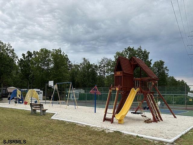 81 Flounder Ocean View, NJ 08230 - Photo 16 of 20 a view of a park with a slide