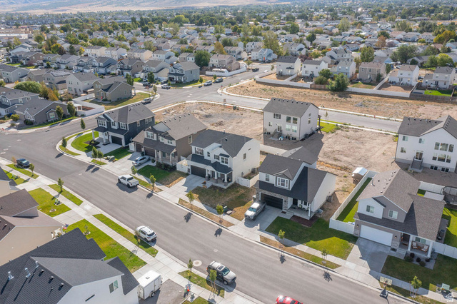 373 Quartz Road Tooele, UT 84074 - Photo 32 of 38 Residential neighborhood featuring paved streets, developed landscaping, and newly constructed homes
