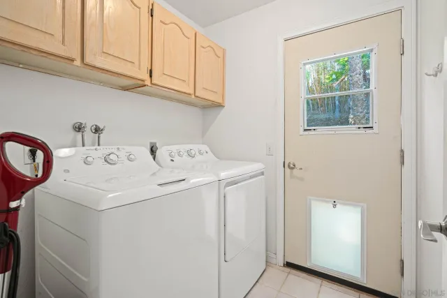 a bedroom with bed and large window