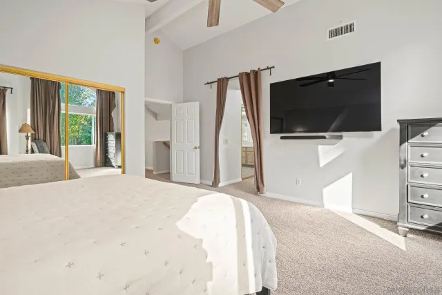a bathroom with bathtub and window