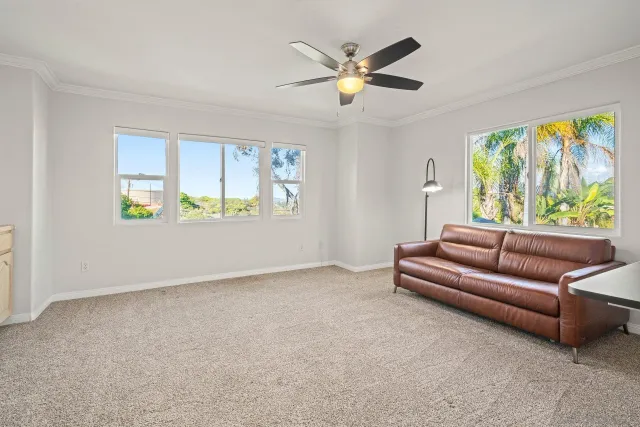 a view of an empty room with stairs