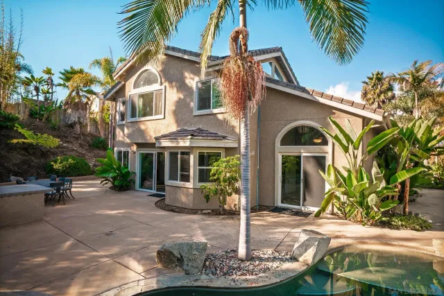 a table and chairs in a backyard