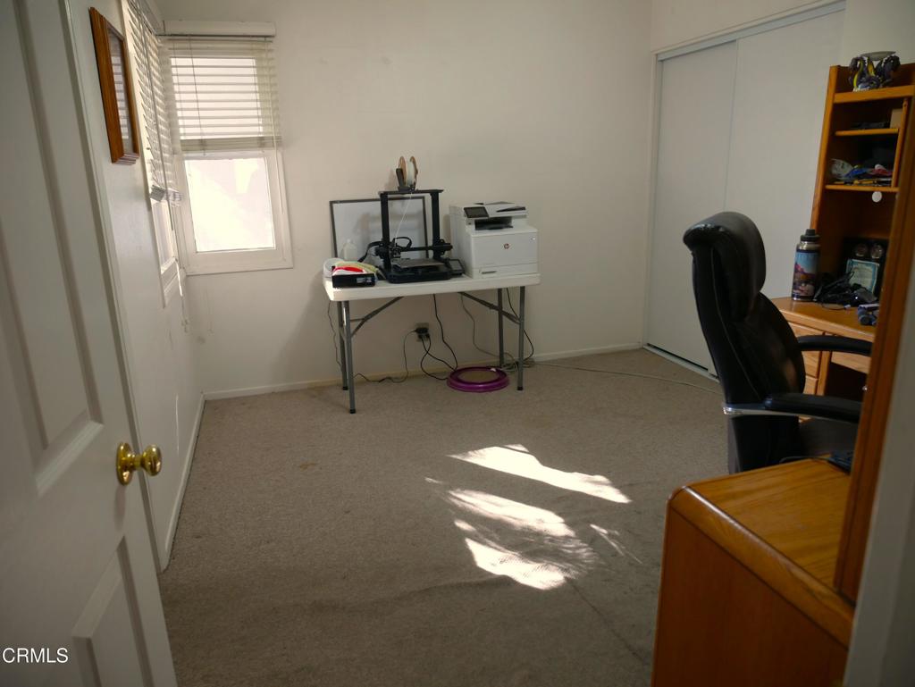 1772 Weston Circle Camarillo, CA 93010 - Photo 11 of 36 a view of a workspace with furniture and a window