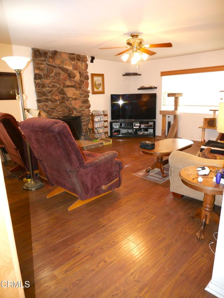 1772 Weston Circle Camarillo, CA 93010 - Photo 14 of 36 a living room with furniture and a flat screen tv
