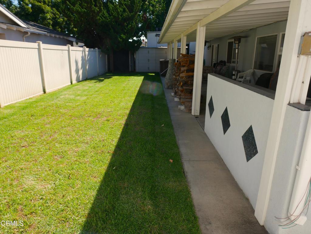 1772 Weston Circle Camarillo, CA 93010 - Photo 23 of 36 a backyard of a house with table and chairs