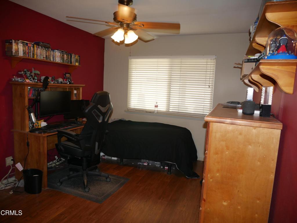 1772 Weston Circle Camarillo, CA 93010 - Photo 26 of 36 a bedroom with a bed and a flat screen tv