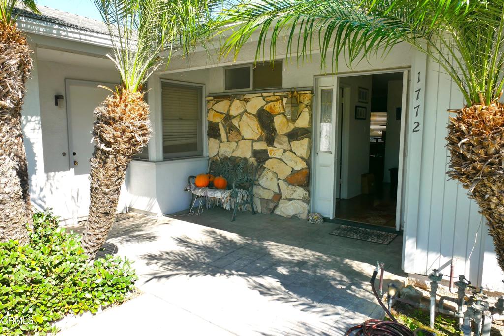 1772 Weston Circle Camarillo, CA 93010 - Photo 7 of 36 a view of a house with a patio and a yard