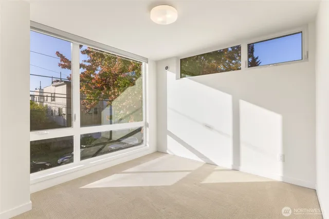 a view of a living room with a large window