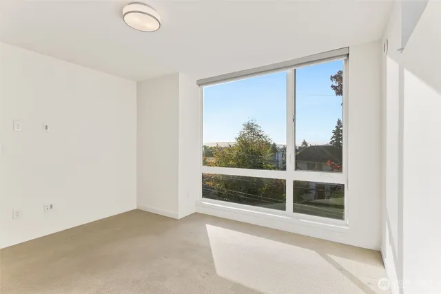 a view of a room with a large window