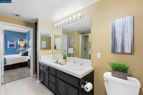 a view of a room with an entryway and hallway