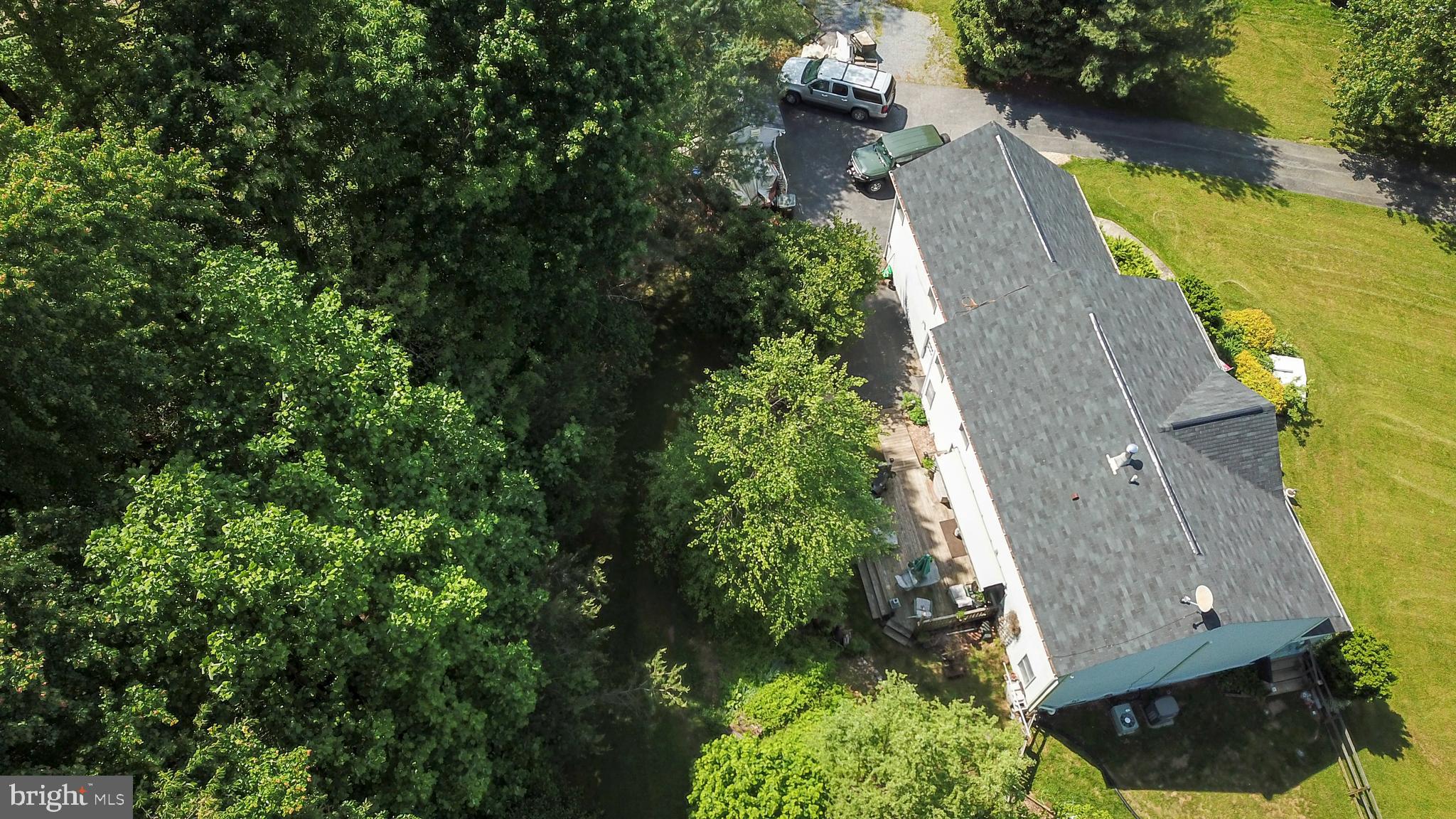 7732 Talbot Run Road Mount Airy, MD 21771 - Photo 4 of 53 The ~deck is a haven for gazing into the trees
