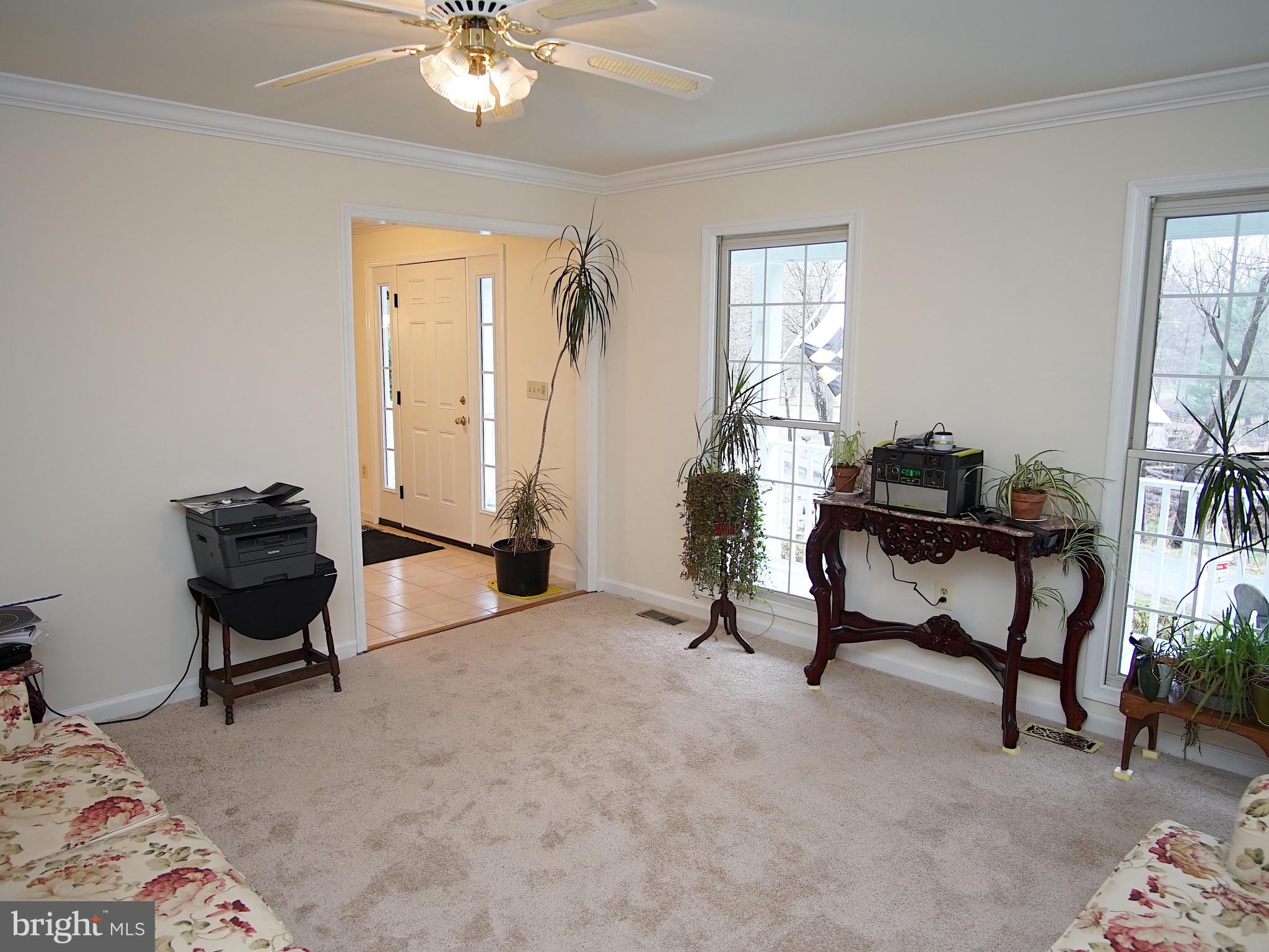 7732 Talbot Run Road Mount Airy, MD 21771 - Photo 9 of 53 Natural light pours in this living room