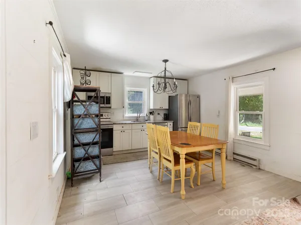 a view of a dining room with furniture