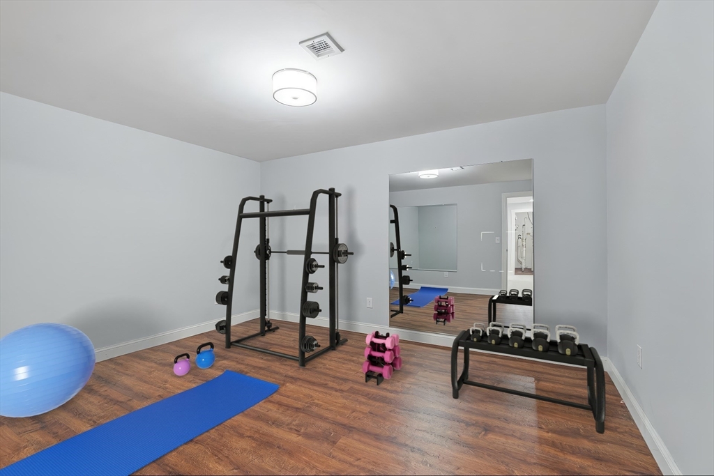 22 Willow Park Wellesley, MA 02481 - Photo 21 of 27 a living room with furniture and wooden floor