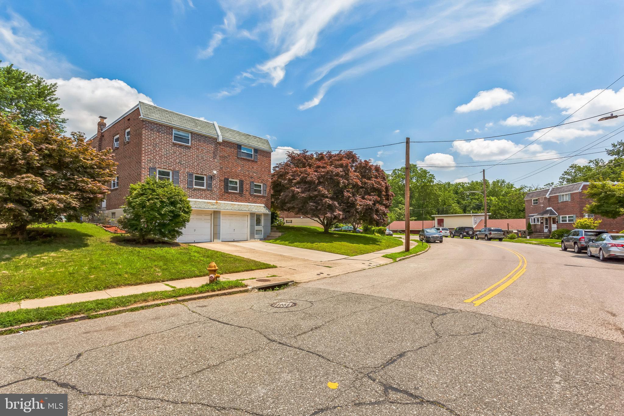 1125 Solly Avenue Philadelphia, PA 19111 - Photo 2 of 49 a view of a house with a yard and plants