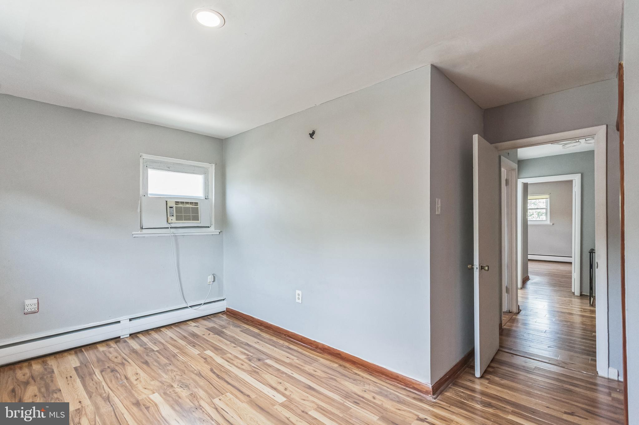1125 Solly Avenue Philadelphia, PA 19111 - Photo 26 of 49 a view of a room with wooden floor and white doors