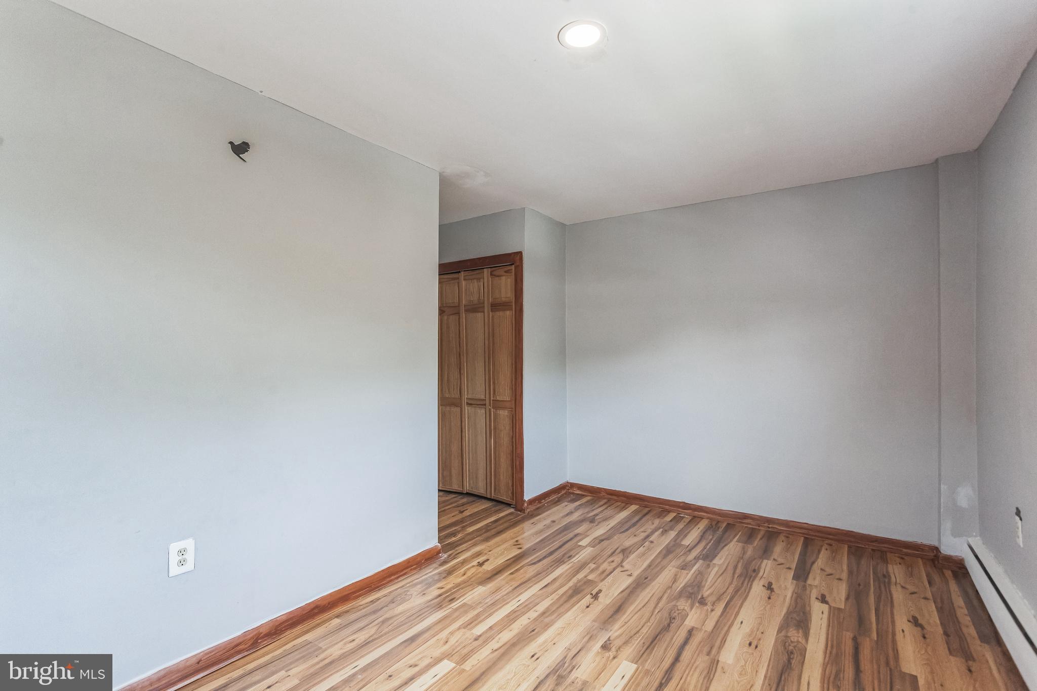 1125 Solly Avenue Philadelphia, PA 19111 - Photo 27 of 49 a view of empty room with wooden floor