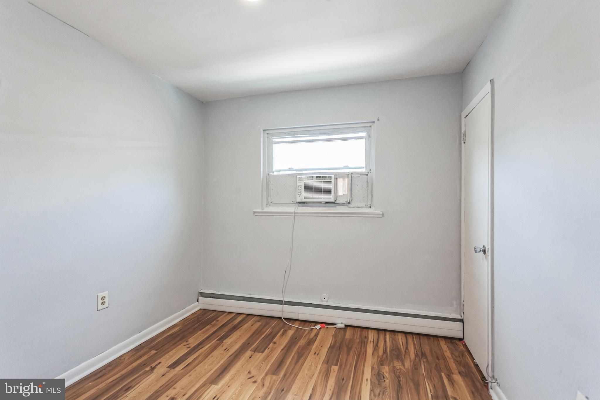1125 Solly Avenue Philadelphia, PA 19111 - Photo 29 of 49 a view of a room with wooden floor and windows