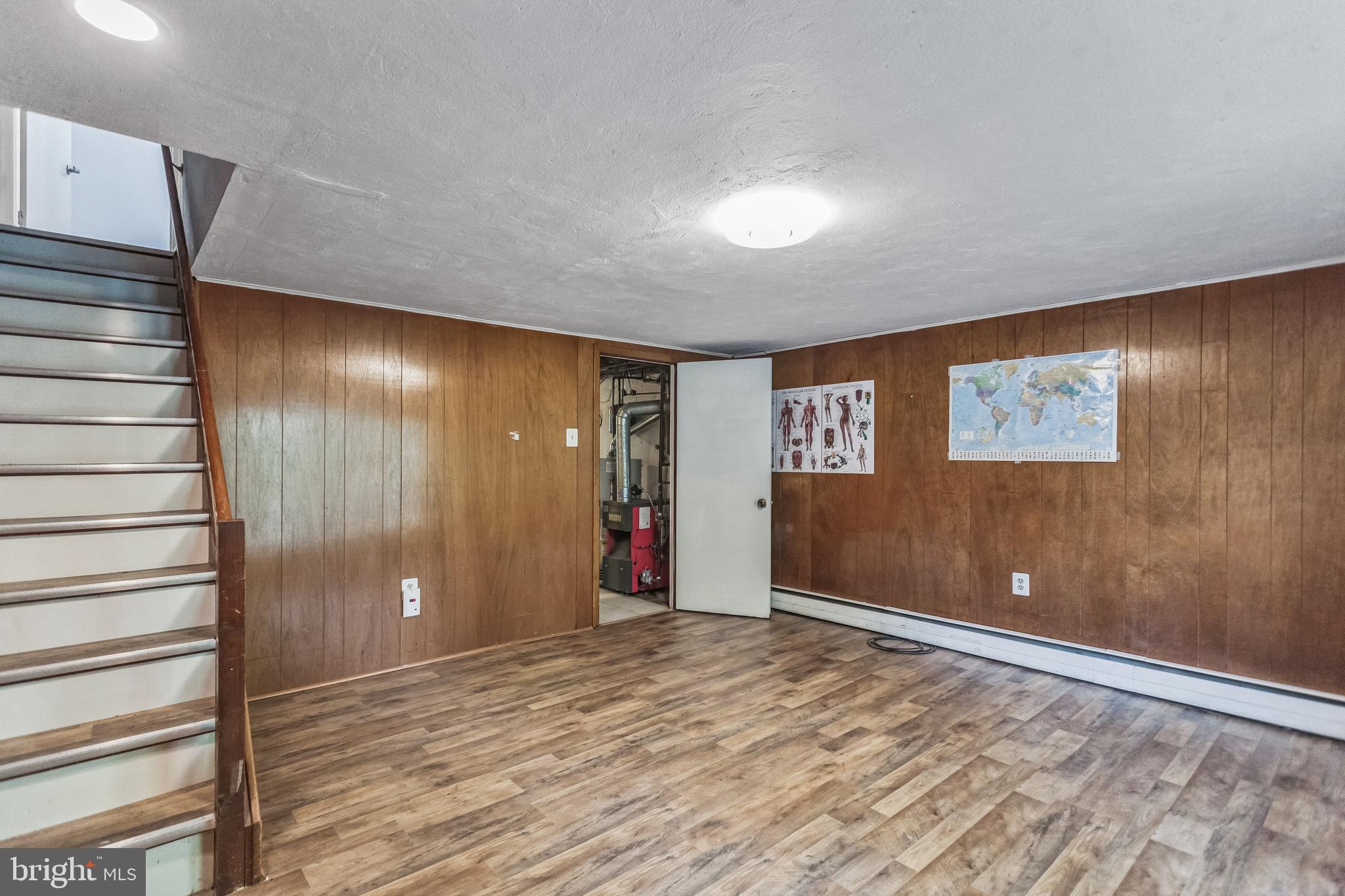 1125 Solly Avenue Philadelphia, PA 19111 - Photo 35 of 49 a view of a livingroom with wooden floor