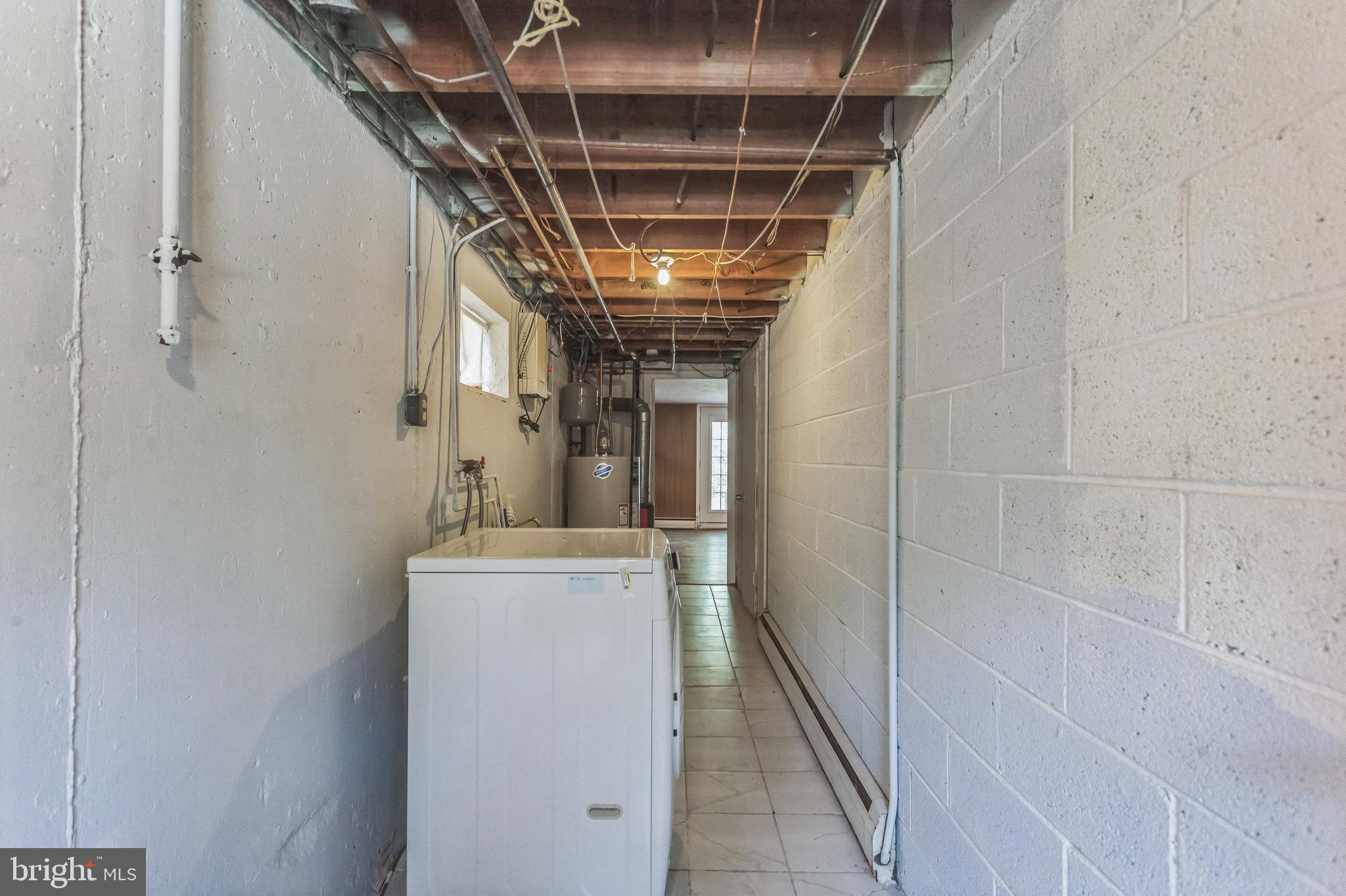 1125 Solly Avenue Philadelphia, PA 19111 - Photo 39 of 49 a view of a storage & utility room with racks on the wall