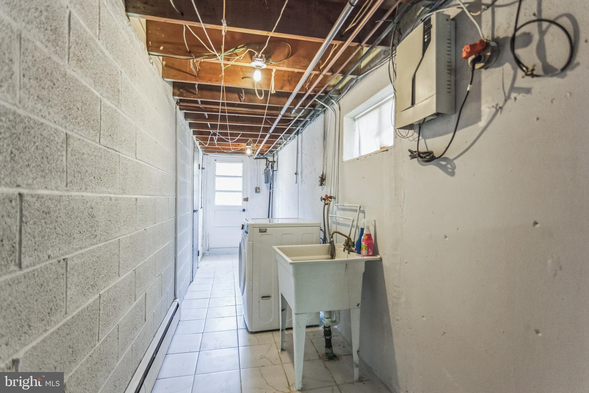 1125 Solly Avenue Philadelphia, PA 19111 - Photo 40 of 49 a bathroom with a sink and a shower