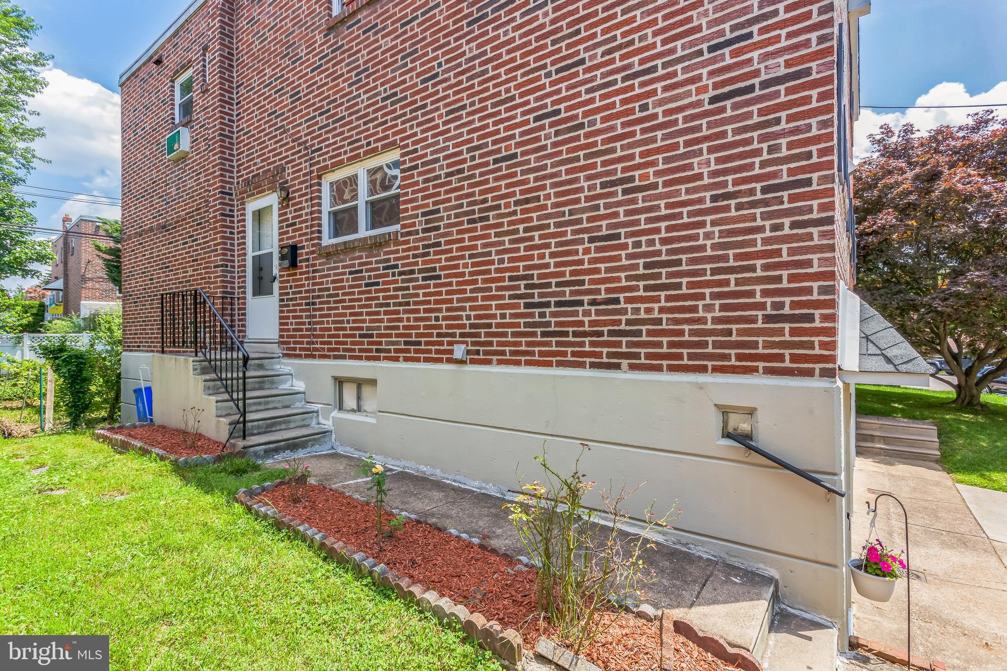 1125 Solly Avenue Philadelphia, PA 19111 - Photo 43 of 49 a front view of a house with a garden