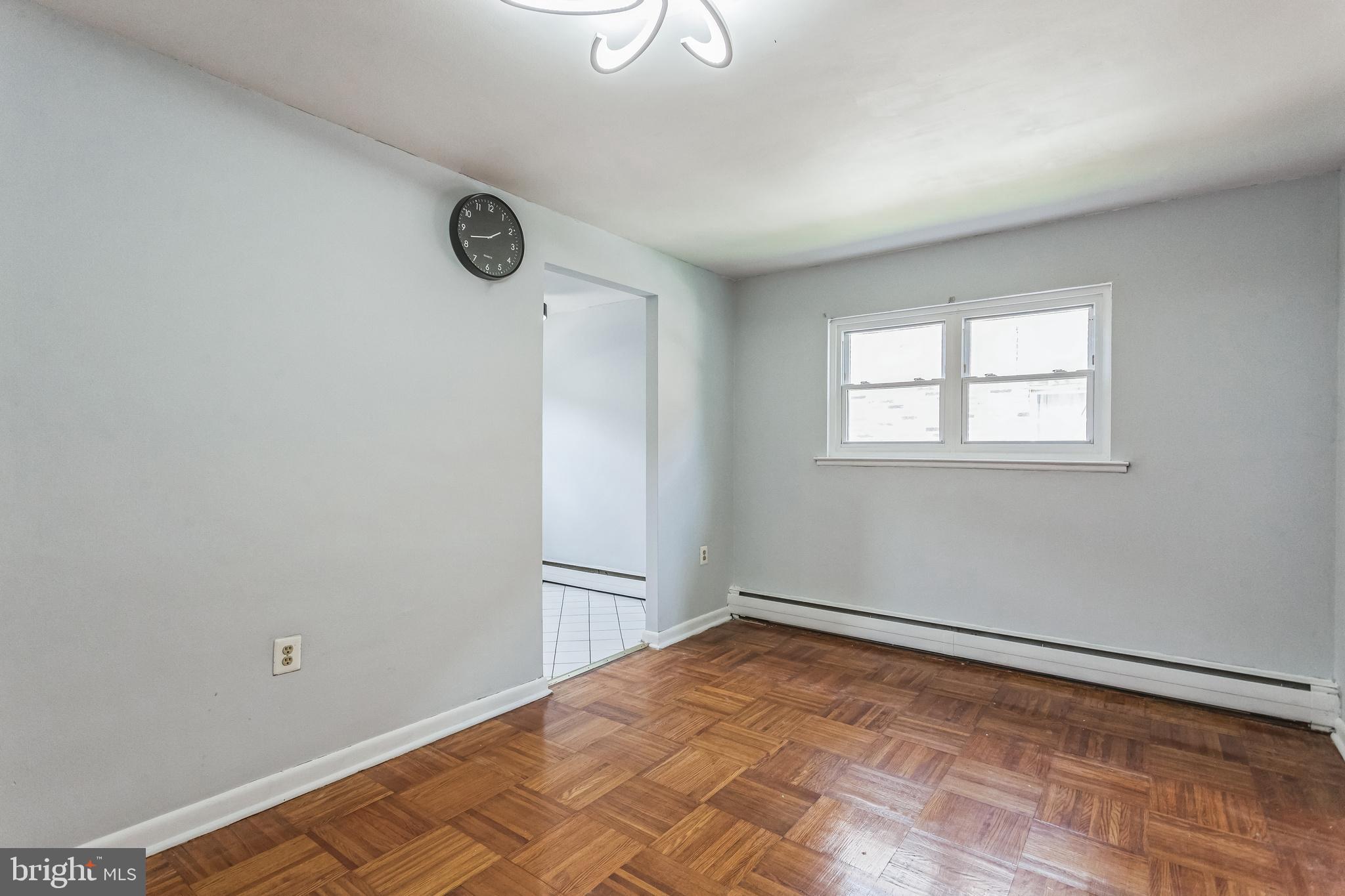 1125 Solly Avenue Philadelphia, PA 19111 - Photo 7 of 49 a view of a room with wooden floor and window