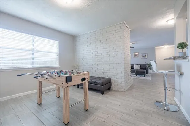 a room with furniture and a wooden floor