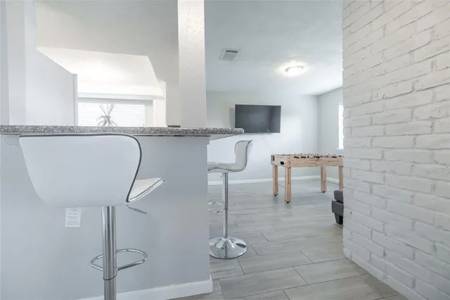 a workspace with furniture and window