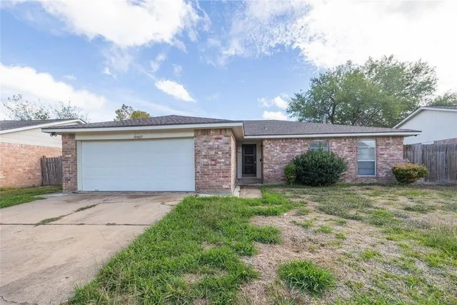 front view of a house with a pathway
